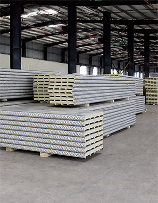 Custom-sized insulated sandwich panels cut to project dimensions for industrial applications