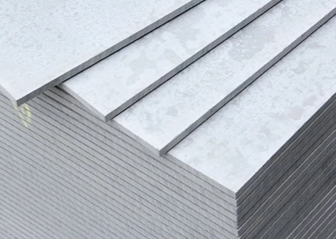 Fibre reinforced cement board with textured surface used for exterior cladding and facade applications