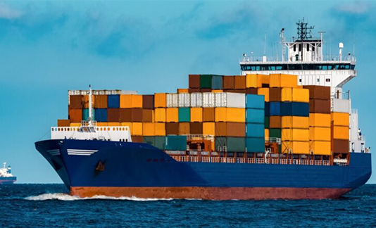 Sea freight container loaded with steel building components for international shipment