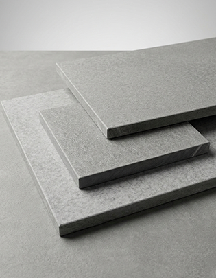Synthetic fibre cement board with impact-resistant surface designed for industrial construction